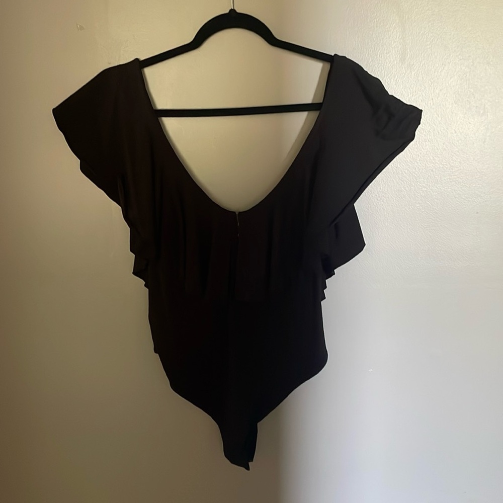 Free People; Black ruffle snack bottom body suit